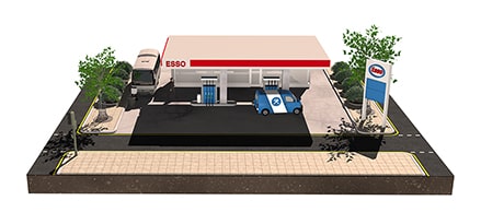 En modell av en Esso-stasjon med gr?nne planter